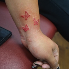 small-red-butterflies-tattoo